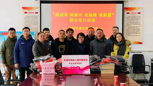 图为冬季送温暖现场